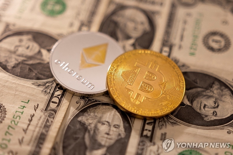 암호화폐 비트코인 가격이 한때 6%대까지 하락했다. (로이터 연합뉴스 자료사진)